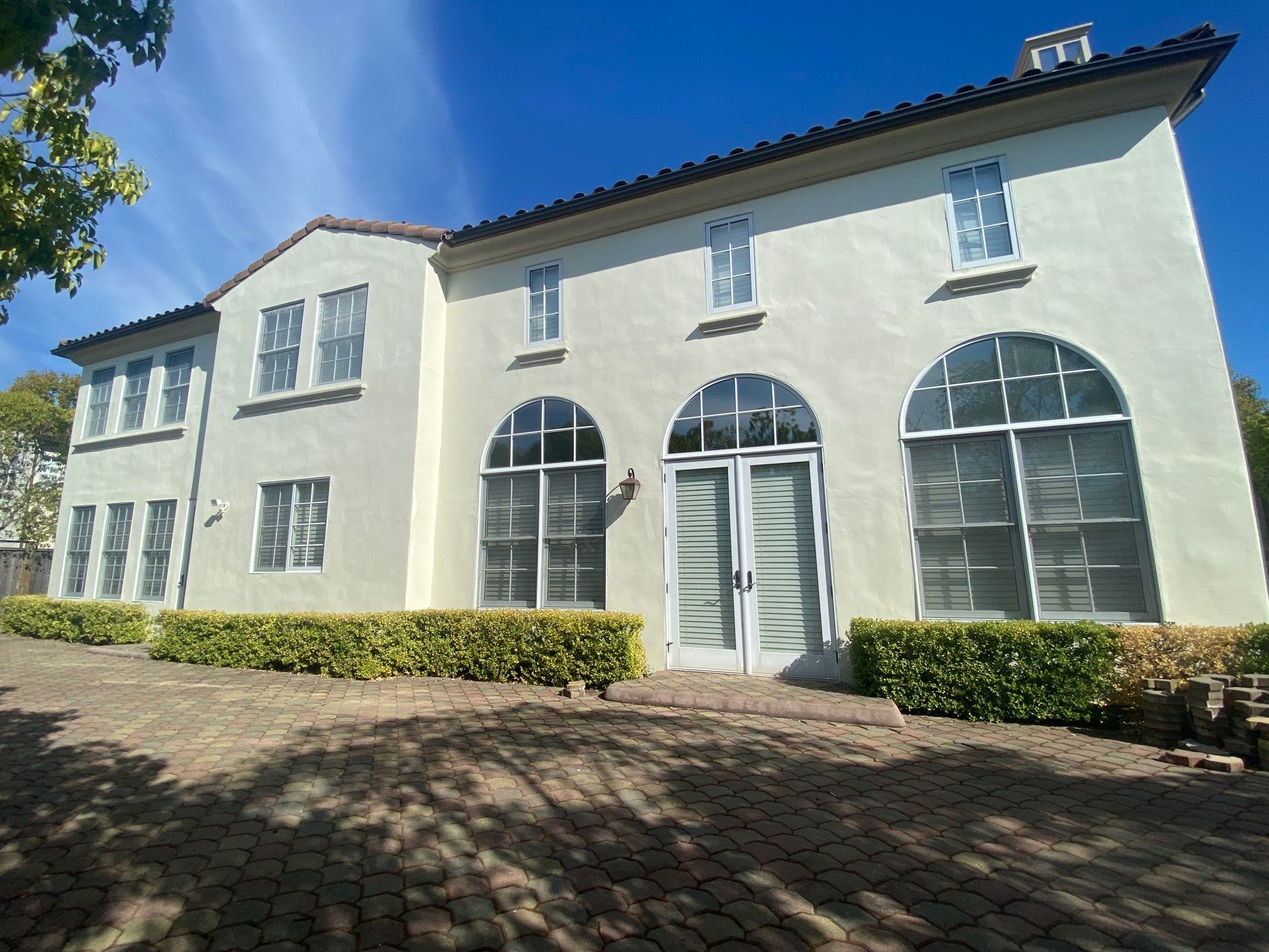 Stucco repaint with weatherproof exterior coating by McCarthy Painting