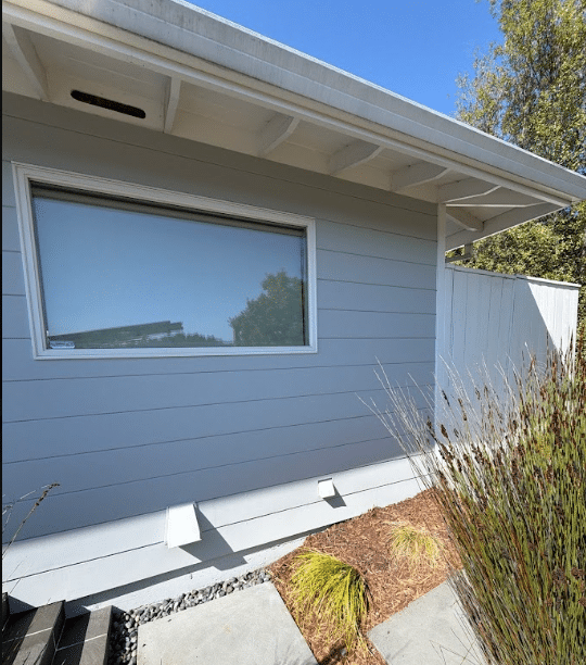 Siding and window trim project by McCarthy Painting