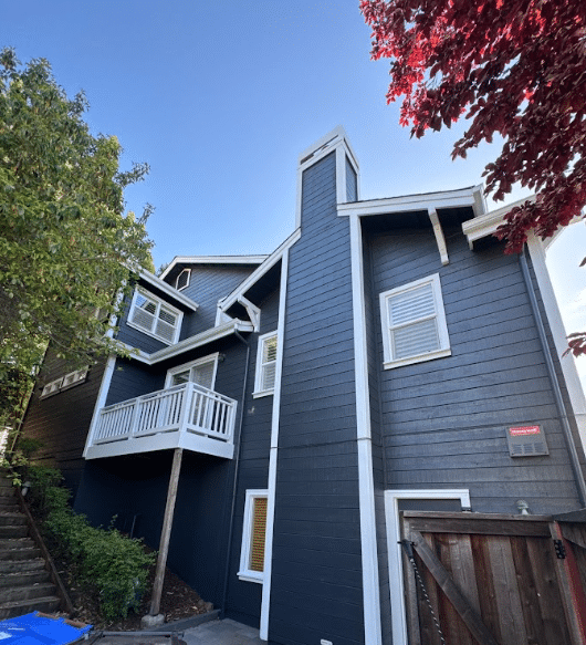 Exterior repaint with gutter system by McCarthy Painting